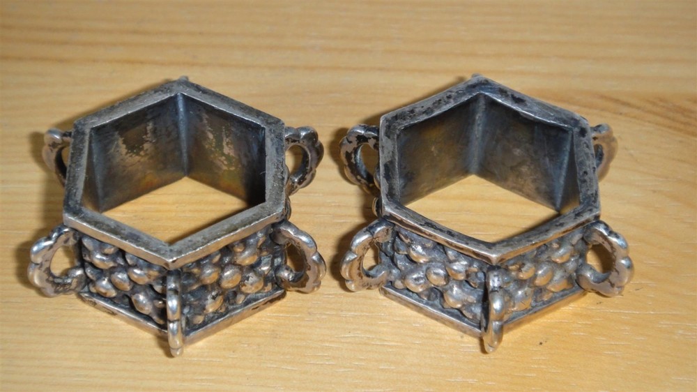 TWO ANTIQUE SILVER HEXAGONAL NAPKIN RINGS - 68 GRAMS