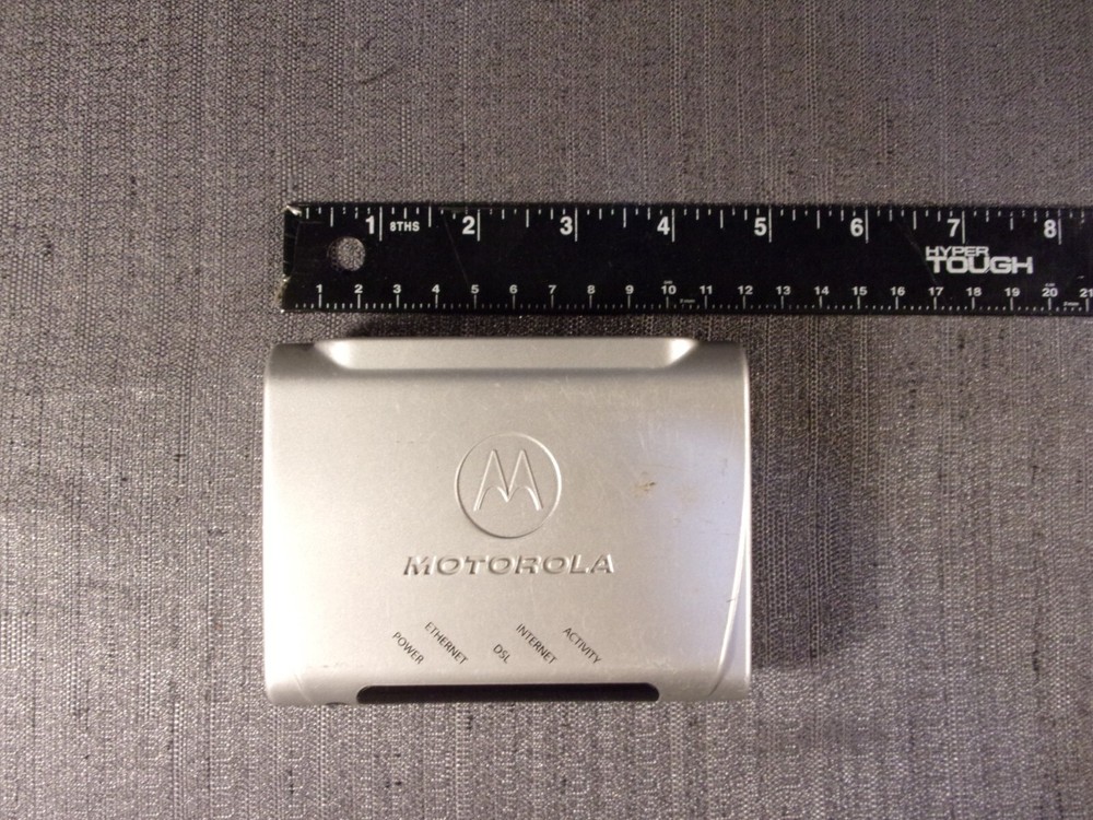 MOTOROLA SILVER E141744 INTERNET MODEM/ROUTER