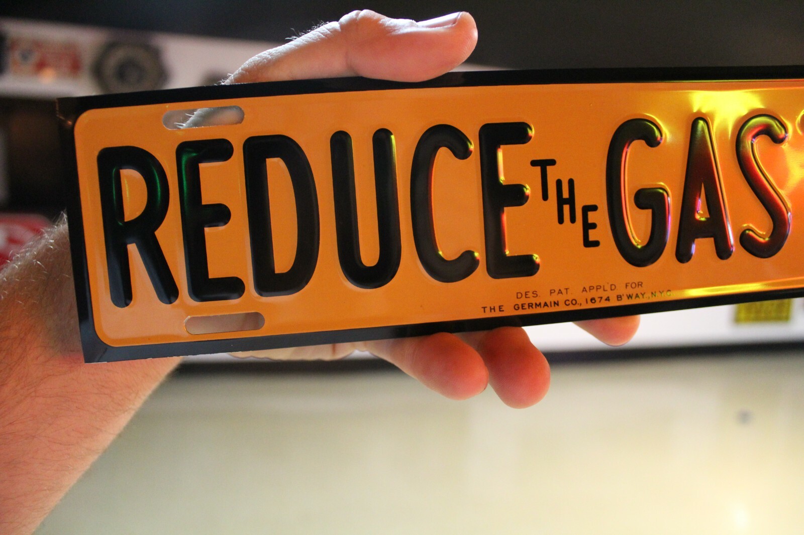 RARE REDUCE THE GAS TAX PLATE TOPPER EMBOSSED METAL SIGN SALES GAS OIL FORD