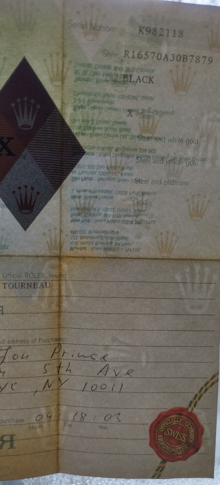 Original Rolex 16570 warranty and chronometer certification c. 2003