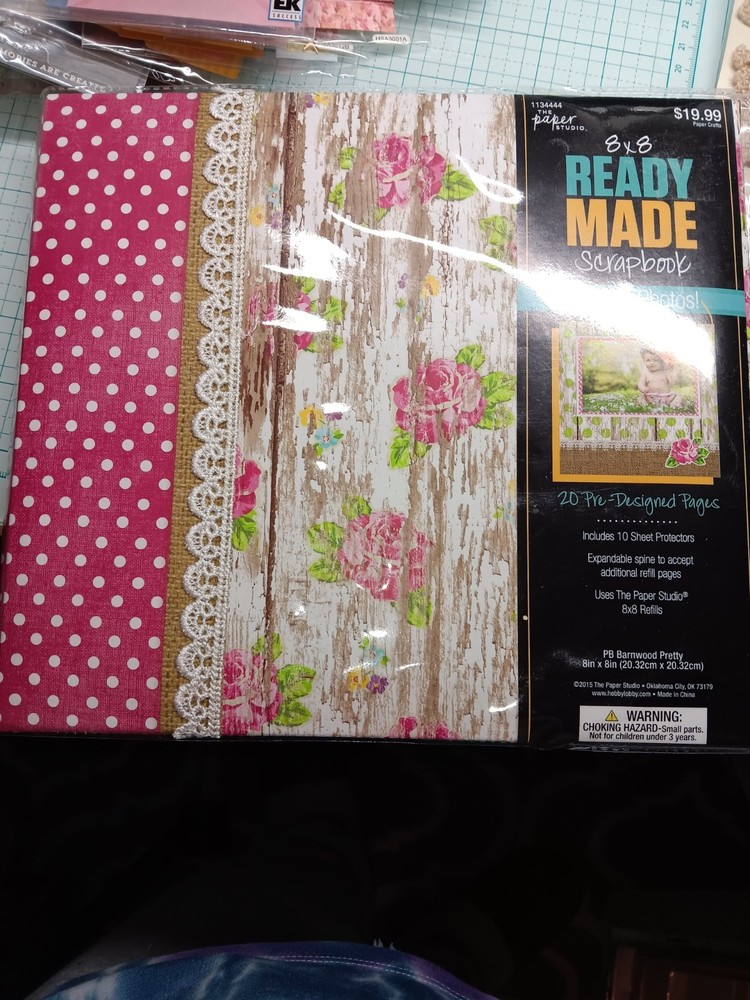Pre made Paper Studio  8x8 scrapbook plus embellishments
