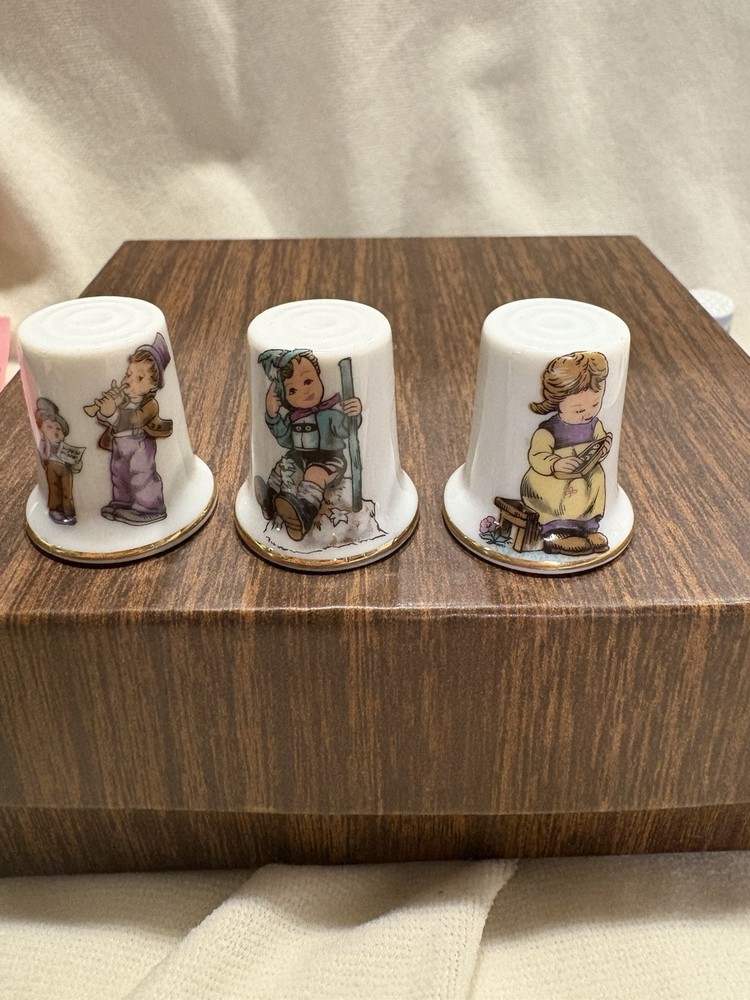 Three Porcelain Thimbles With Children