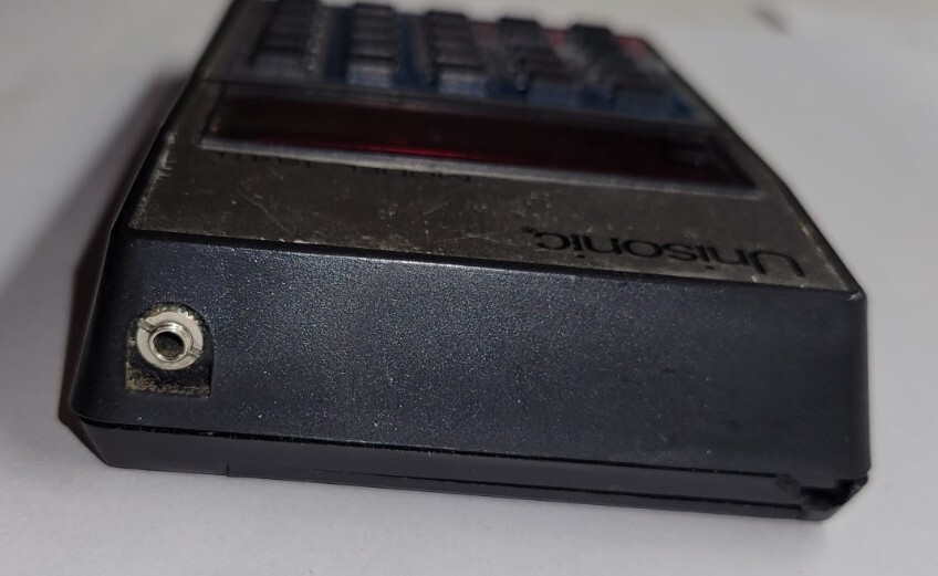 Unisonic Pocket Calculator Model 1541L Chipped Corner. UNTESTED