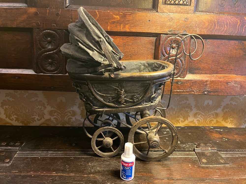 Vintage style toy pram.