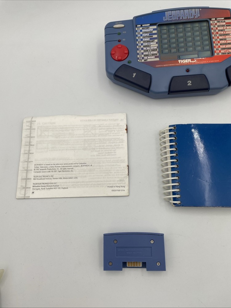 Tiger Electronics Jeopardy Hand Held Game 1995 with Answer Book & Manual E1