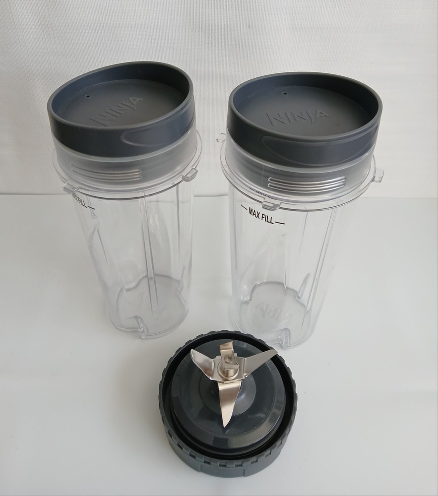 *New* Ninja 5pc Single Serve Set. 2- 16oz Cups & Lids & Extractor Blade Assembly