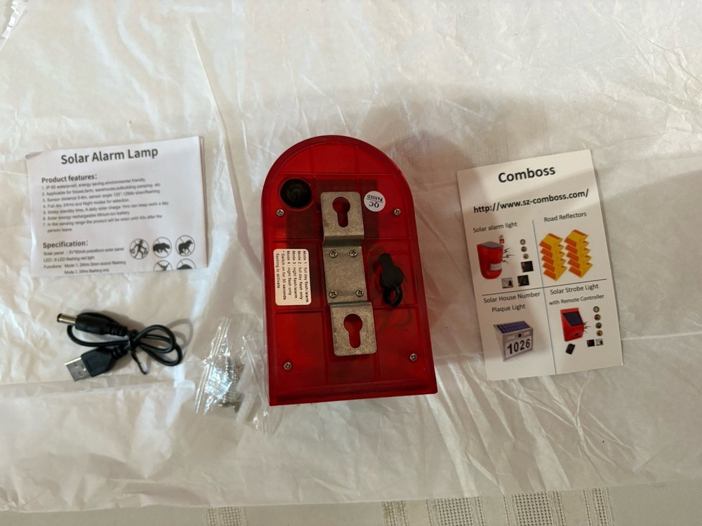 Motion activated solar alarm lamp