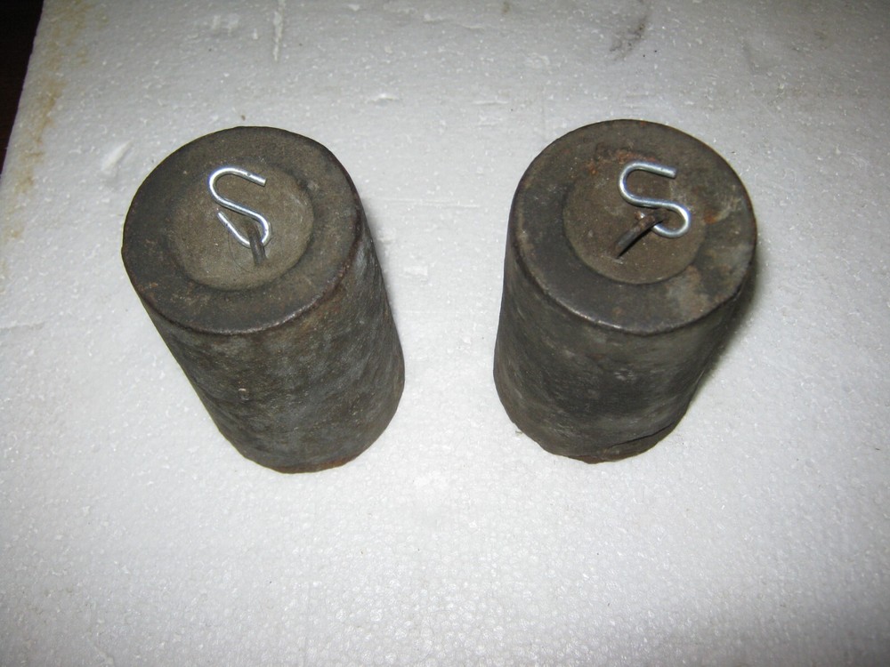 Woodworks Clock Weights: ~ 3lbs 7oz each
