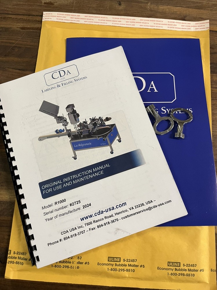 CDA R1000 Bottle Labeler