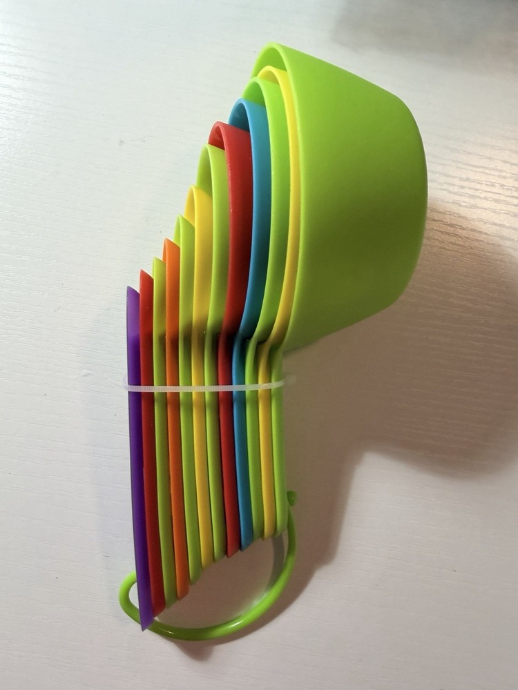 12 Piece Colored Plastic measuring Spoons. New