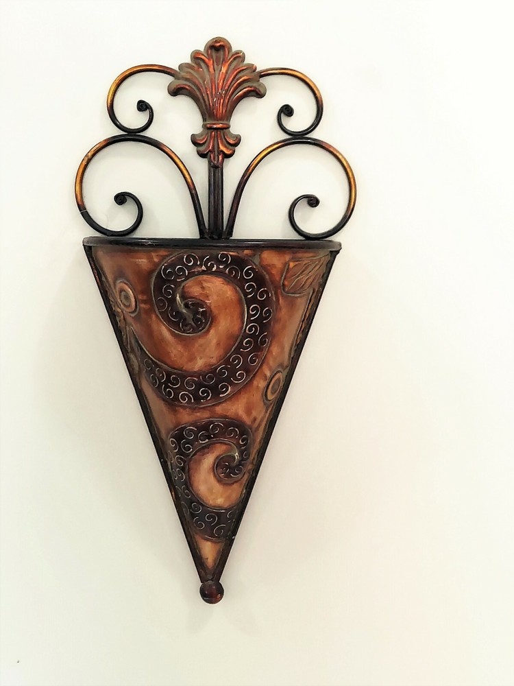 Large scroll work metal wall scone