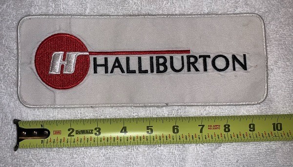 Halliburton patch , white background , pre-owned , large , older design