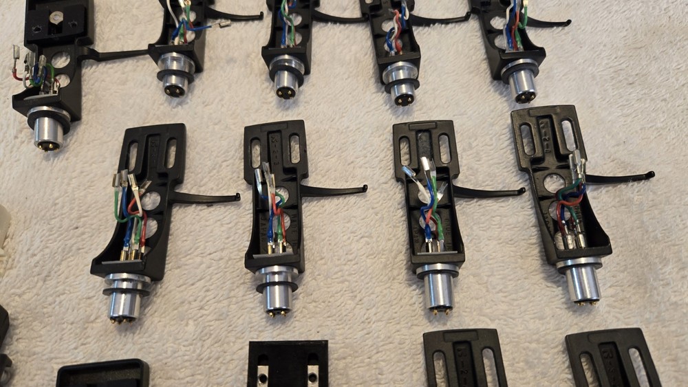 13 Turntable Headshells. 12 OEM Technics, One Pickering. Five P-Mount Adapters