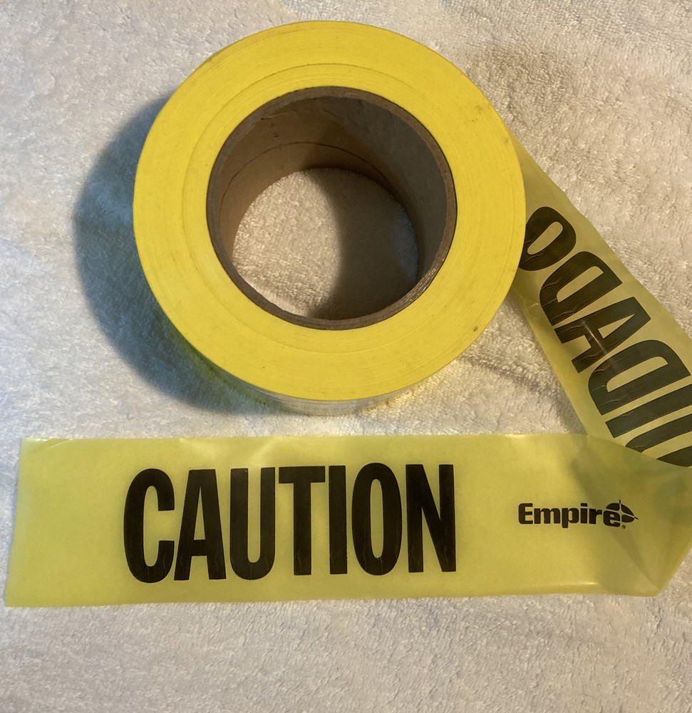 Caution Tape Used Roll Yellow