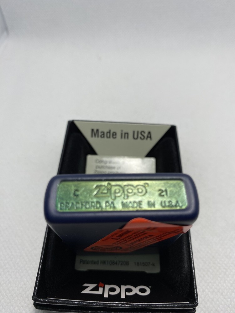Zippo Compass On A Navy Blue Lighter