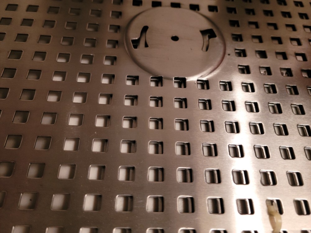 Sur La Table adjustable grilling grid and poultry roaster.