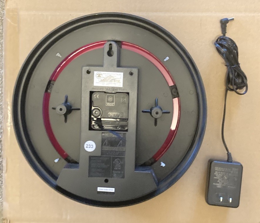 Skunkworks logo neon wall clock