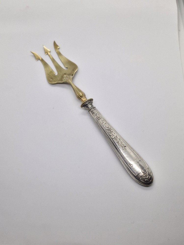 Vintage Antique brass fork with silver handle