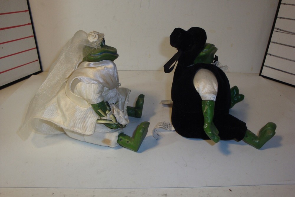 Mr. And Mrs.Pondhopper figures with tags