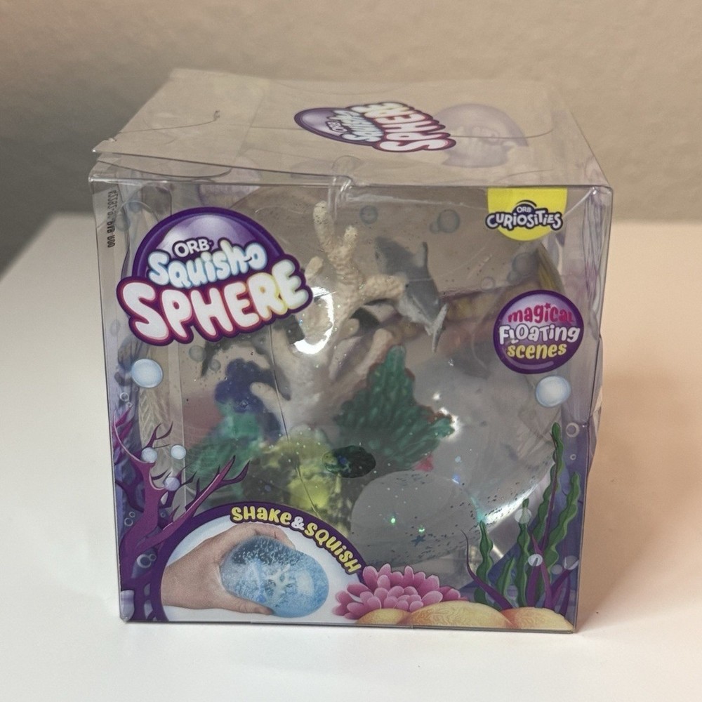 ORB™ Squish-O Sphere Squishy featuring a shark-themed scene inside 🦈