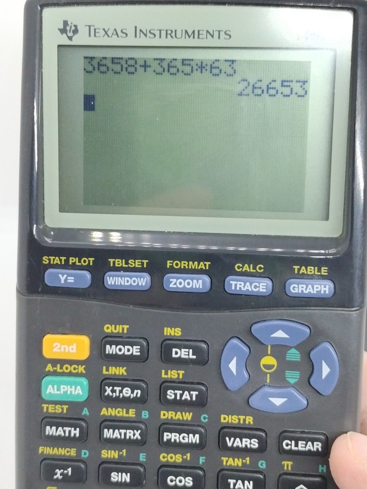 Texas Instruments TI-83 Handheld Graphing Calculator
