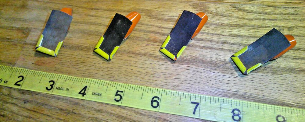 4 original Vintage Tin Litho Clickers