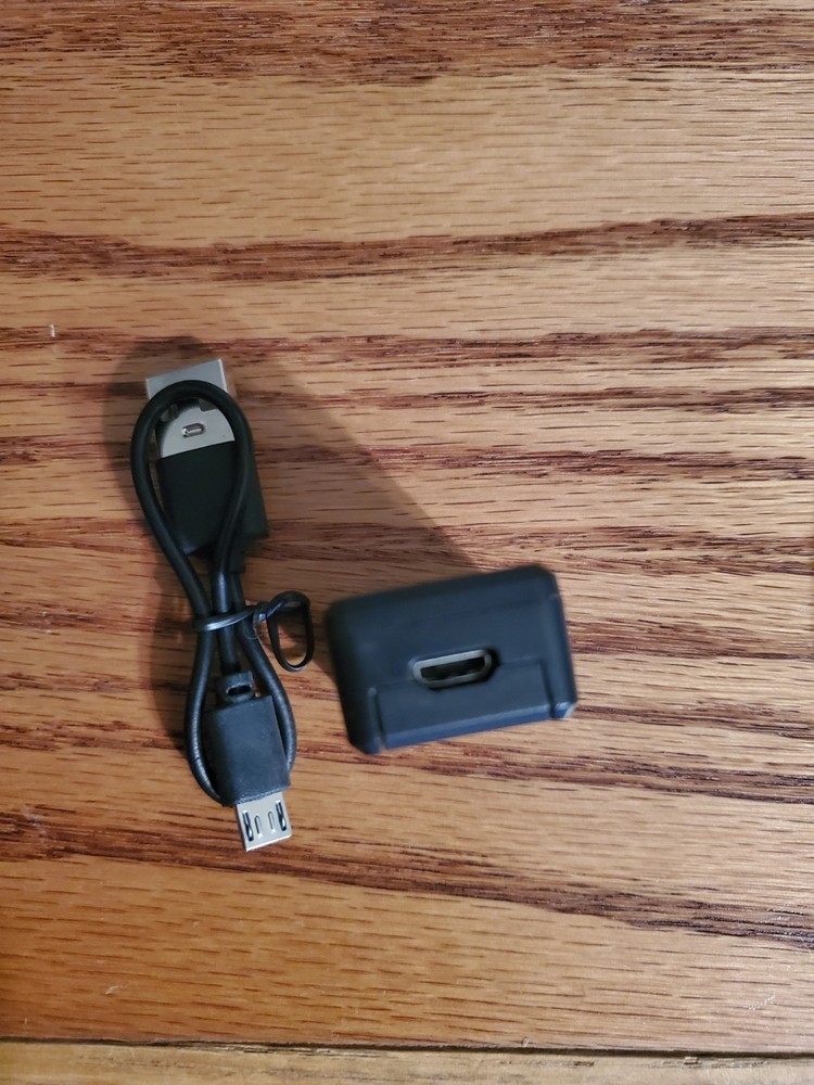 Unbranded GPS Unit, Charge Cord & Pamplet