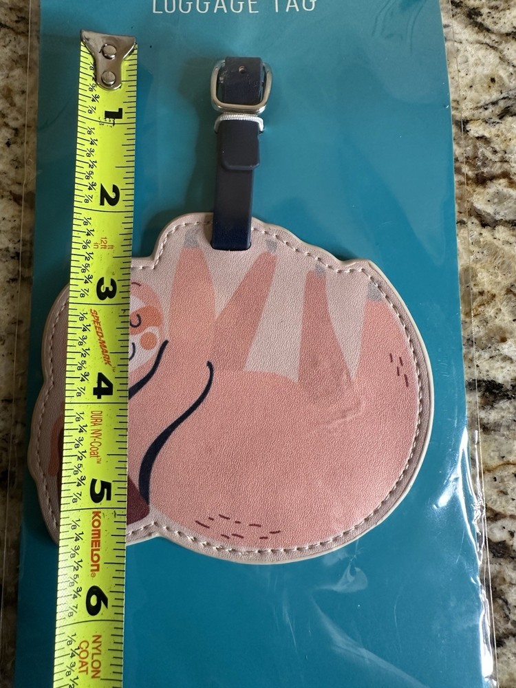 sloth-themed luggage tag