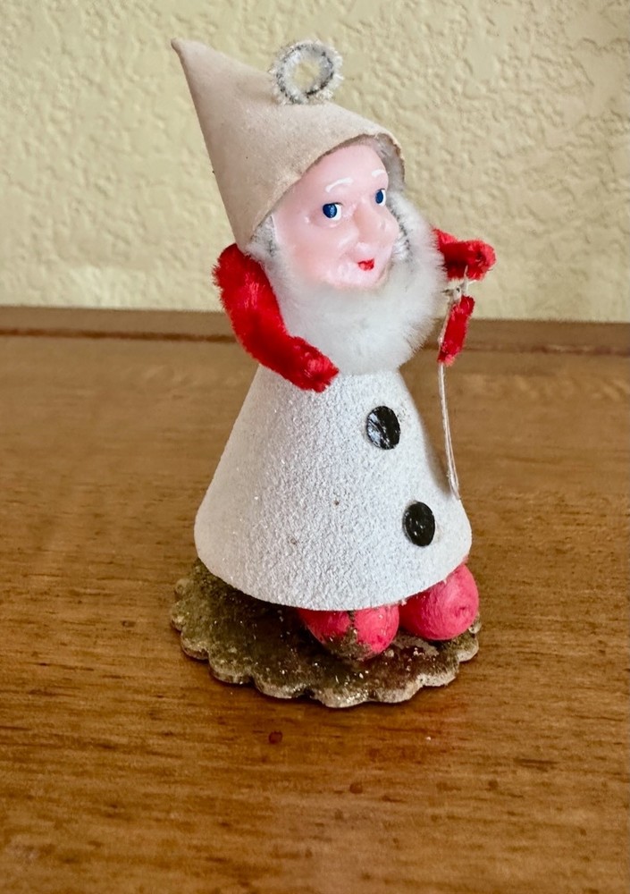 VINTAGE CHRISTMAS ELF HOLDING STOCKING