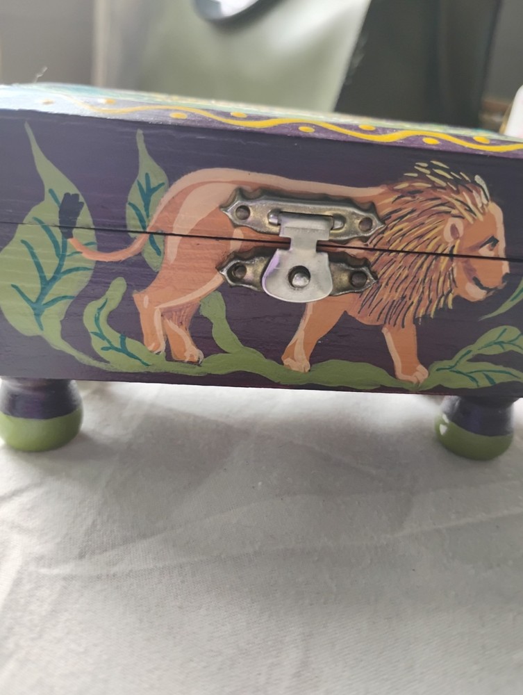 small painted box with tiger, elephant, zebra, lion, monkey