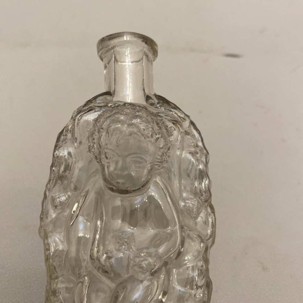 1880 MOSES IN BASKET FIGURAL HAND BLOWN COLOGNE BOTTLE
