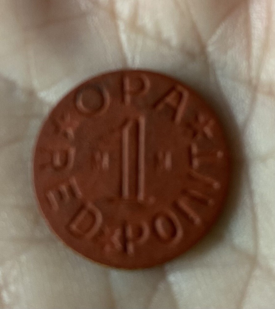 WW II Ration Tokens. Includes the Rare M-M Red token along with a Blue token.