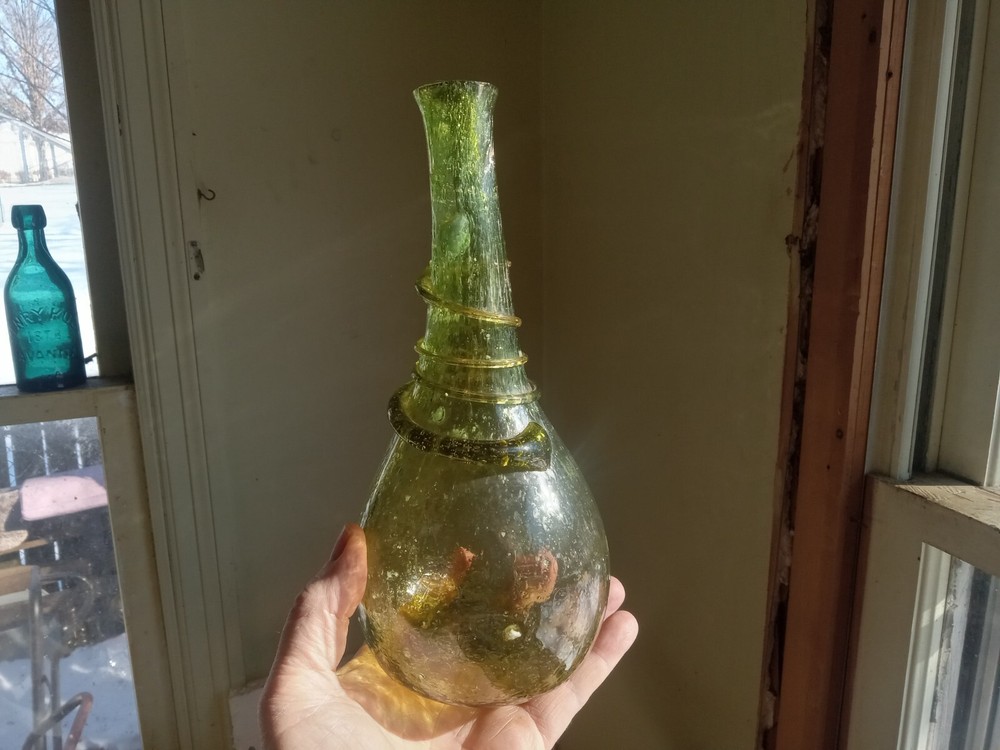 BUBBLY CRUDE HAND BLOWN GLOBULAR SADDLE FLASK BOTTLE WITH DRIPPY APPLIED RING