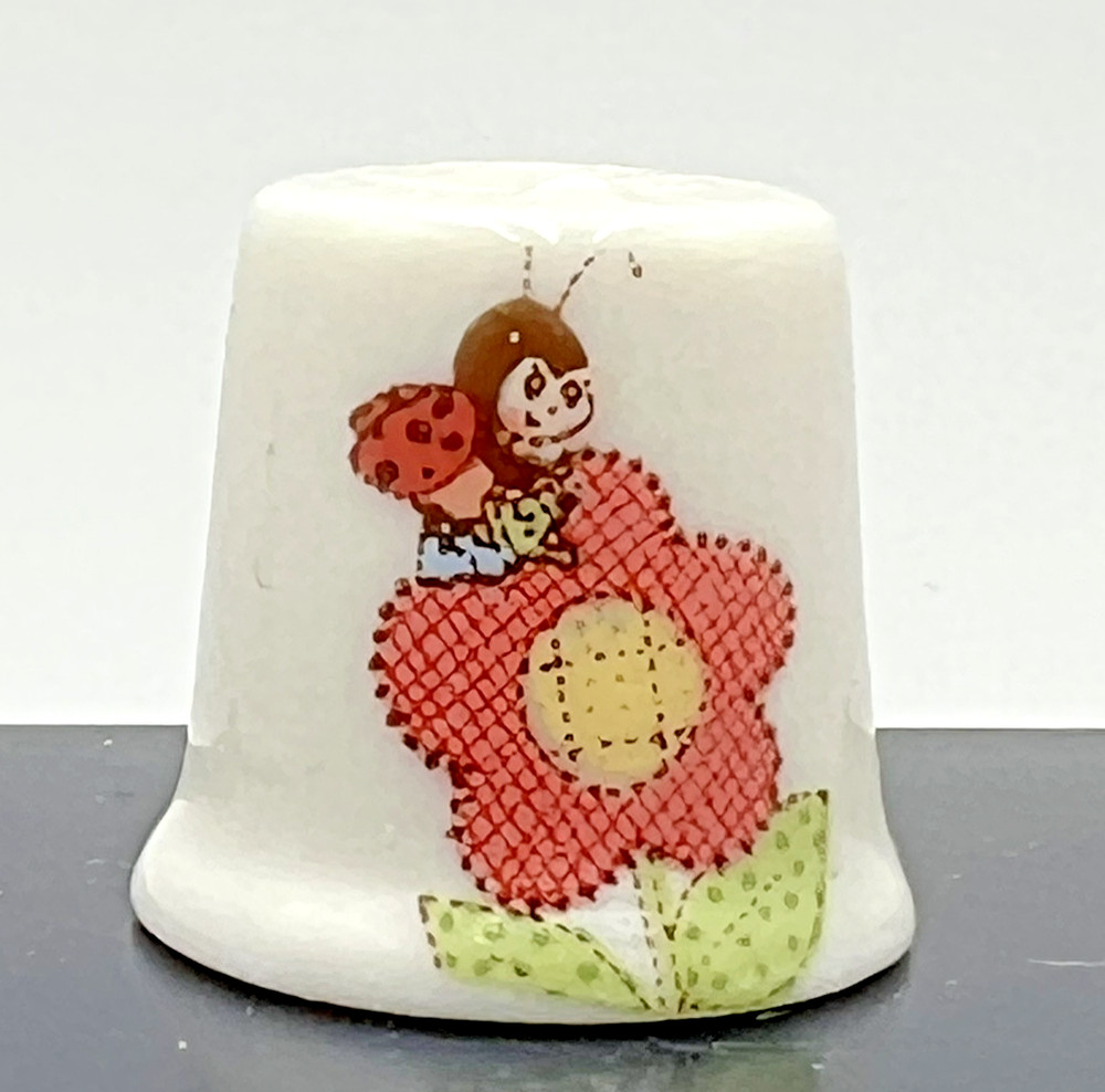 Thimble Ladybug Sitting on Orange Flower Porcelain