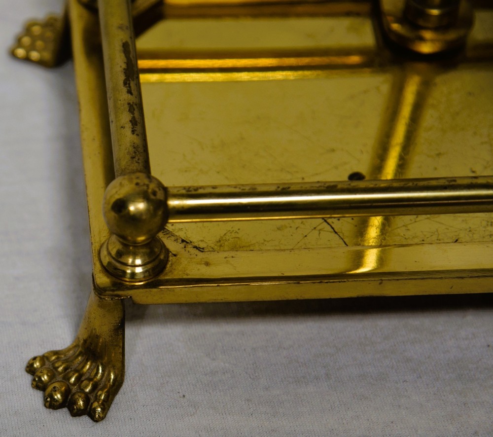 Four-piece brass fireplace poker set