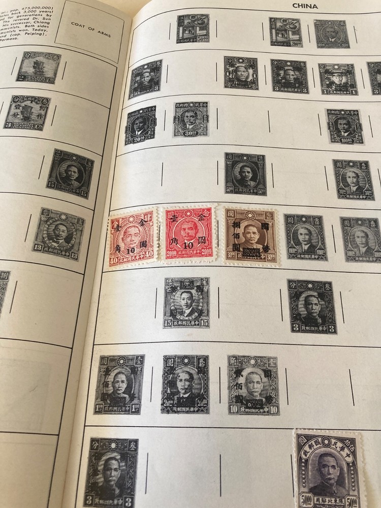 VTG 1956 HE Harris co. Discoverer stamp album--some stamps