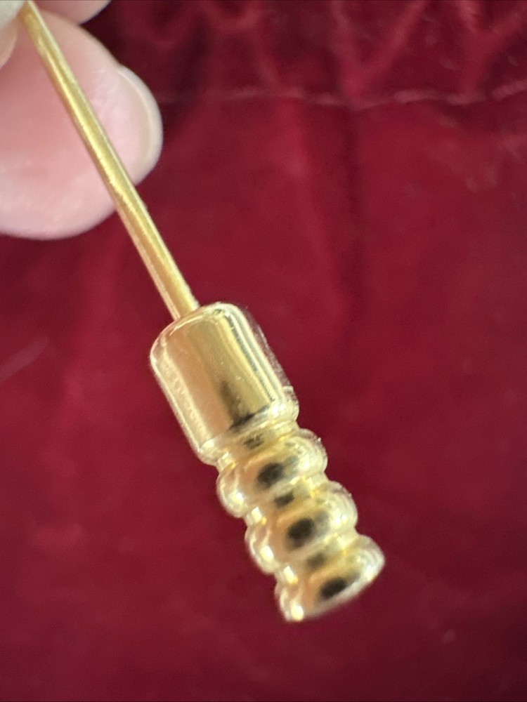 gold-tone monogram lapel pin features a cursive letter 'A' design.