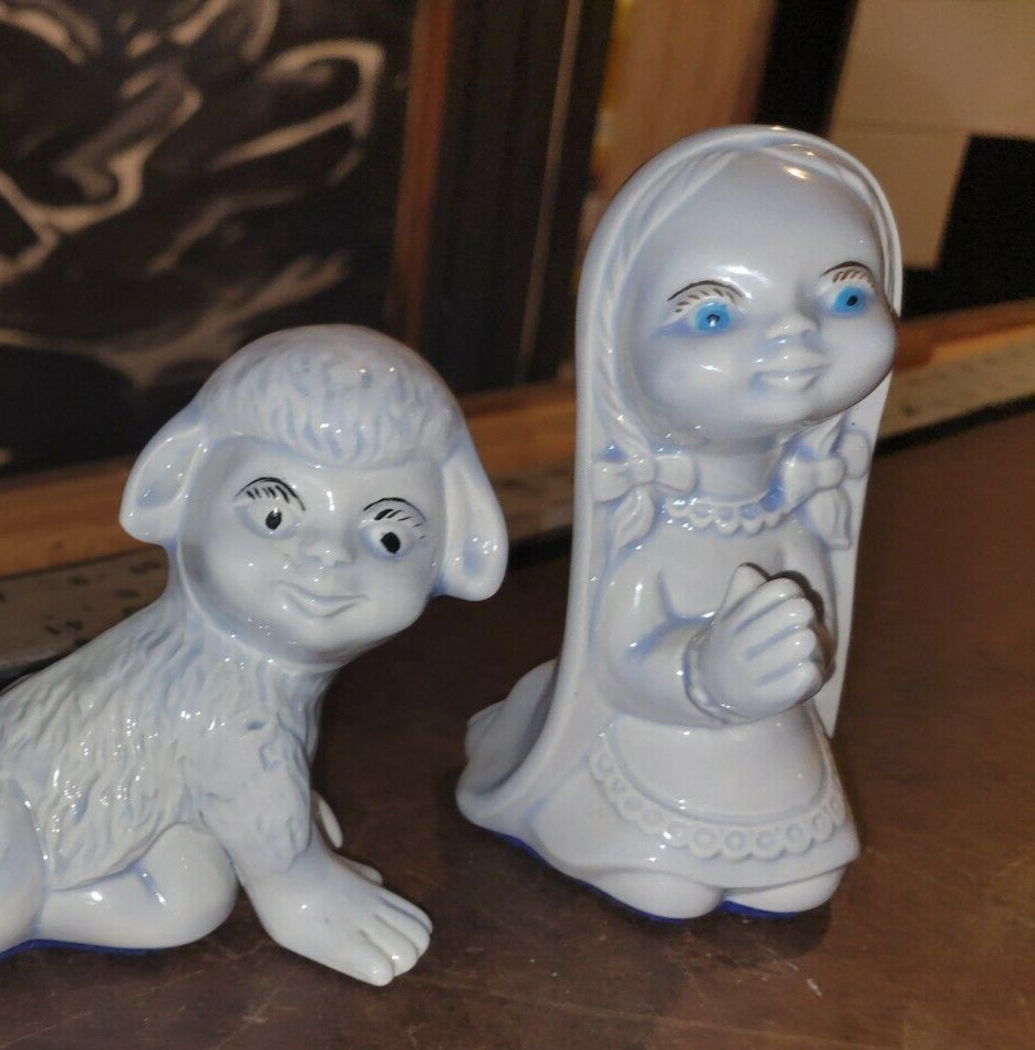 creepy children figurines weird kitsch