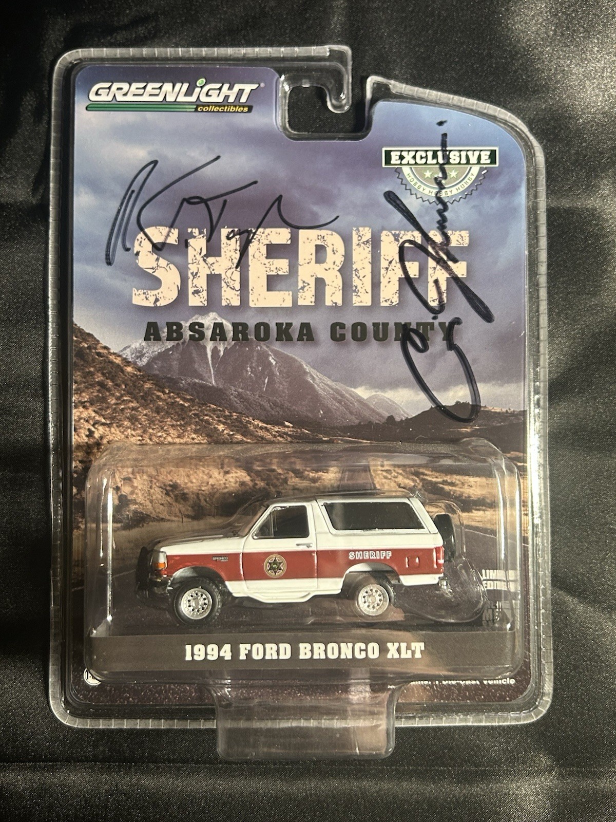 Longmire Bronco 1:64 Signed By Robert Taylor and Craig Johnson at Longmire Days