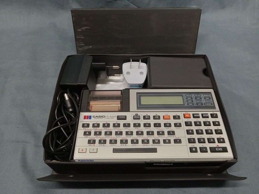 CASIO FX-820P Personal Computer With Charger Case and Manuals FULLY FUNCTIONAL!
