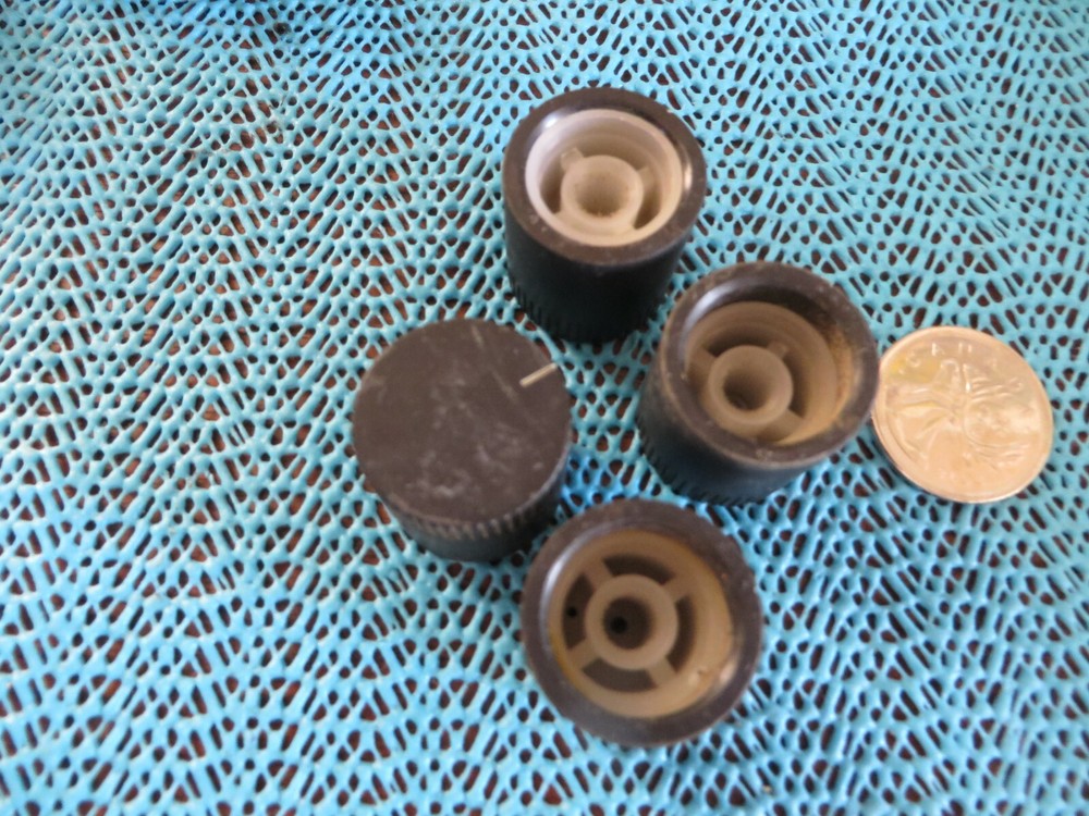 Four radio knobs with spiral flanged end