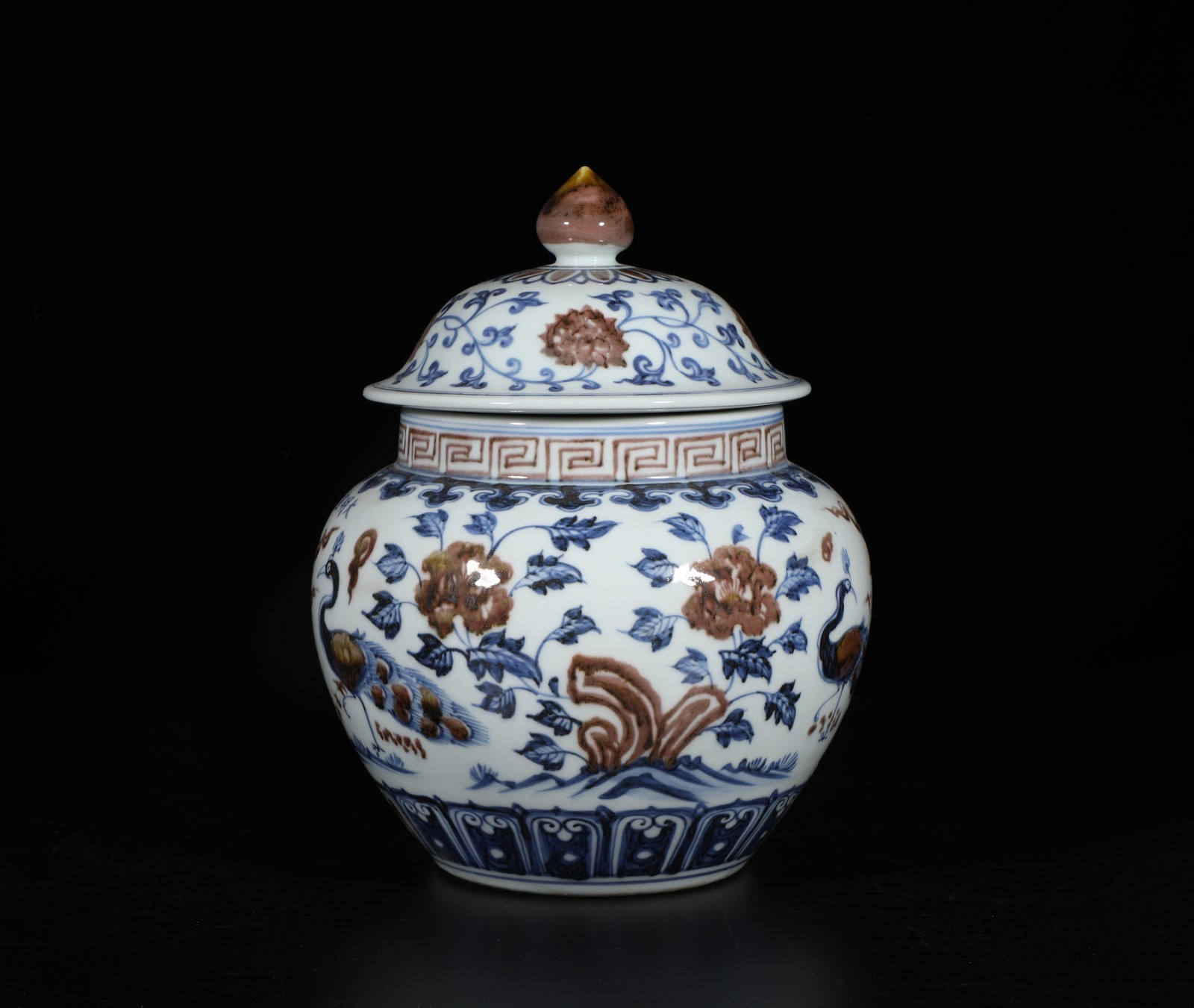 An Iron Red Blue & White Porcelain Jar with lid. 'xuanDe' mark