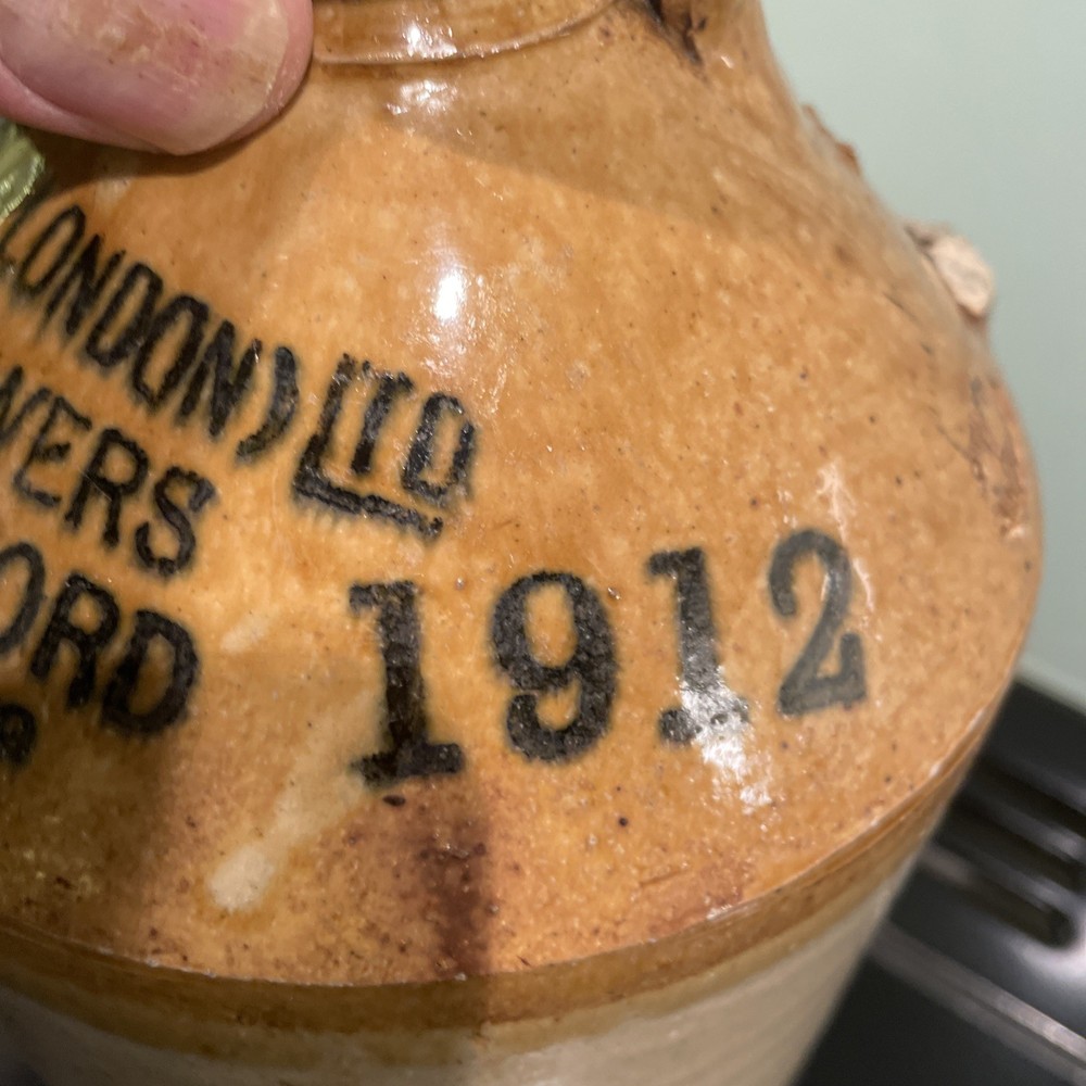 stoneware flagon. White Bros. Ginger Beer. Broken Handle