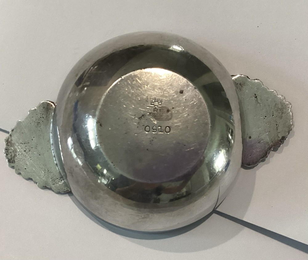 small silver wine tasting bowl