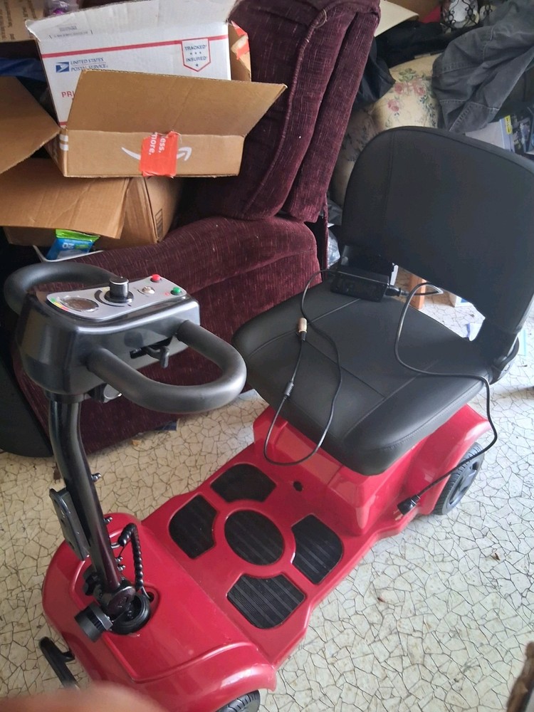 Red Mobility Scooter.