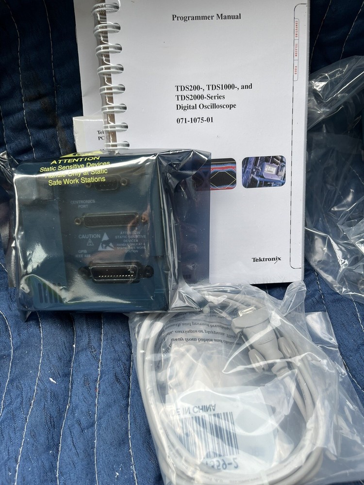 Tektronix TDS 1002 2CH 60MHz. + TDS2CMA communication extension module