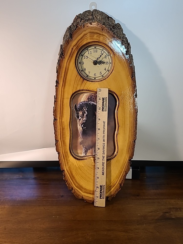 Vintage Laquered Wood Tree Slice Buffalo Clock. Clock Does Not Work.