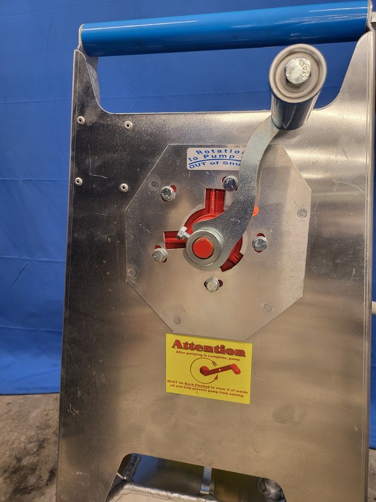 SHORTENING SHUTTLE DISPOSAL CADDY PUMP