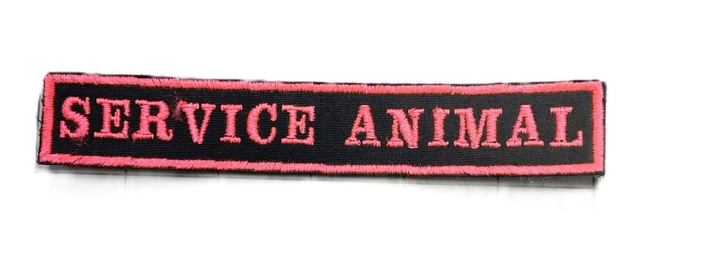 SERVICE ANIMAL 5 1/2" BY 1" Pink text on black patch.  Hook and Loop back