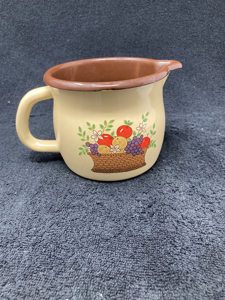 FTD metal pitcher flower pot